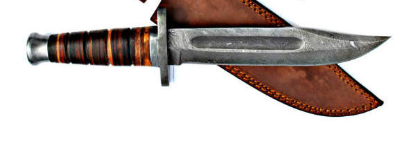 A CLASSIC K-BAR DAMASCUS STEEL