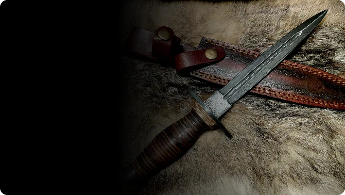 A Damascus Steel dagger laying on a hand-made leather sheath half covered in darkness.