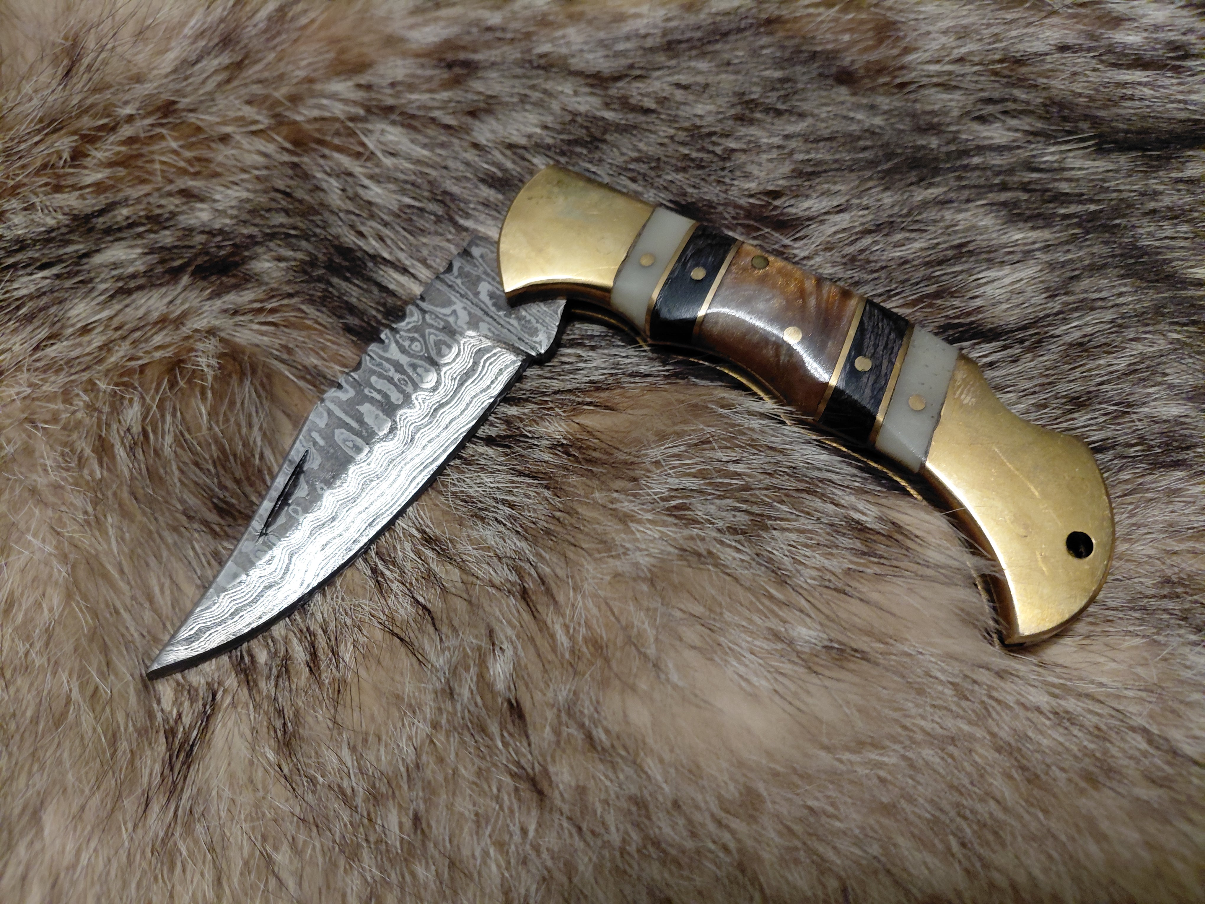 Gold and Bone Folding Knife